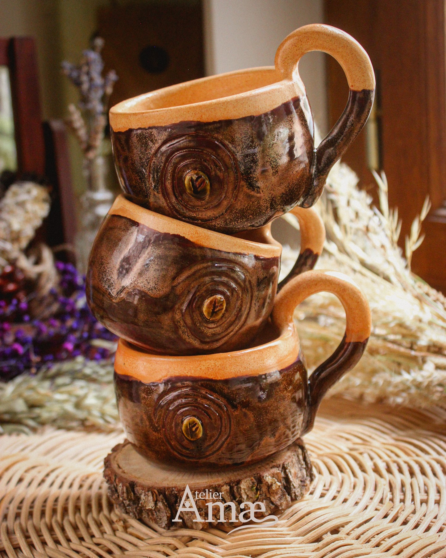 Cup inlaid with the Fehu rune and its Spiral