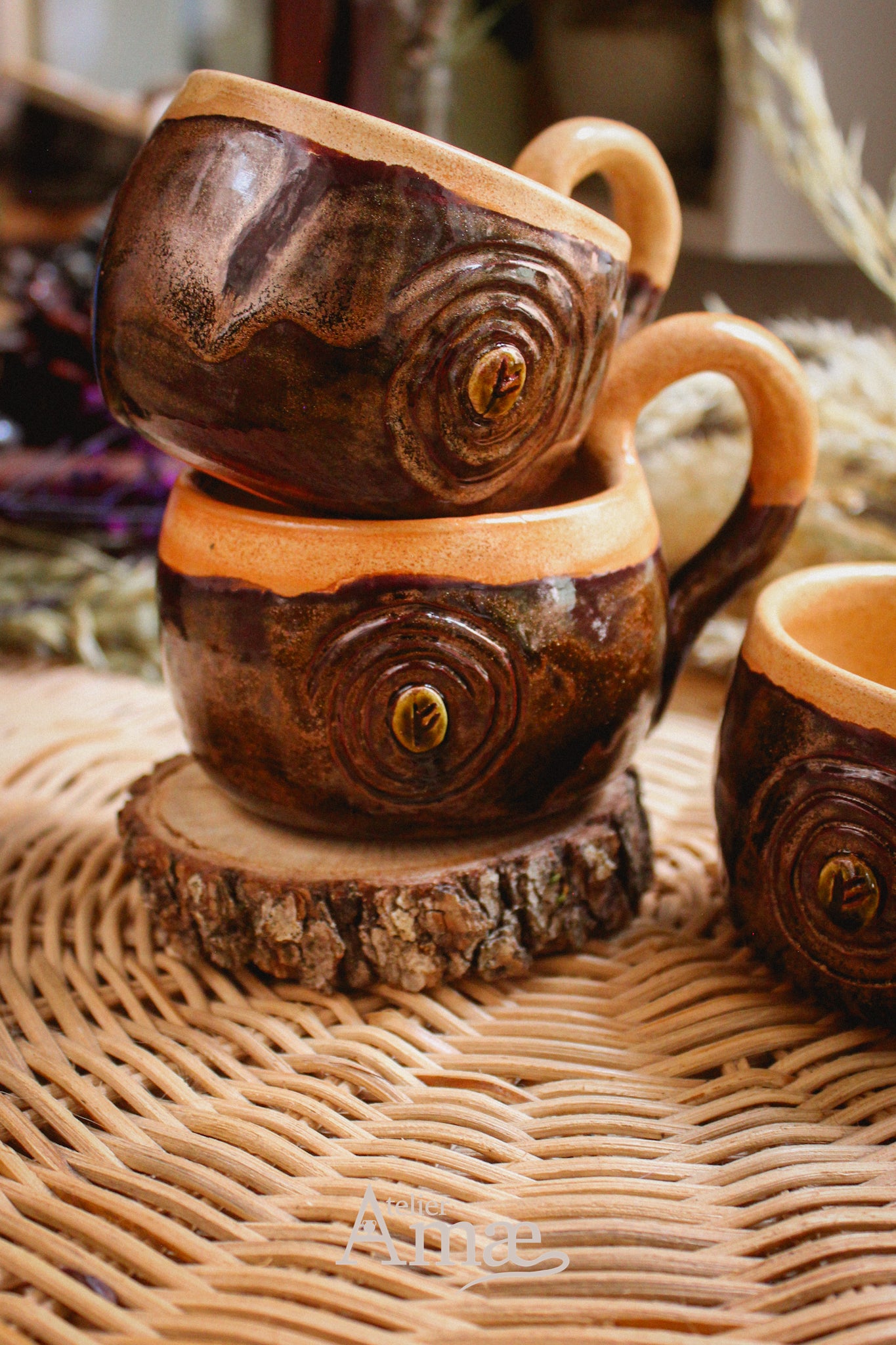 Cup inlaid with the Fehu rune and its Spiral