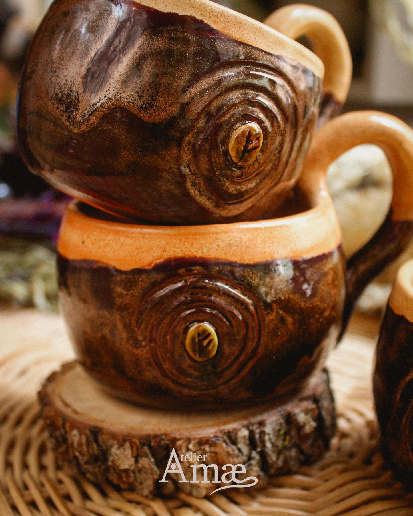 Cup inlaid with the Fehu rune and its Spiral