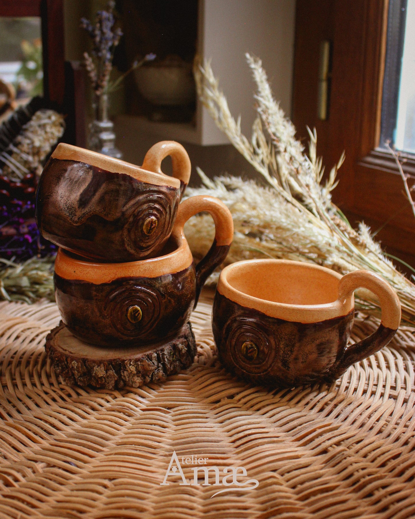 Cup inlaid with the Fehu rune and its Spiral