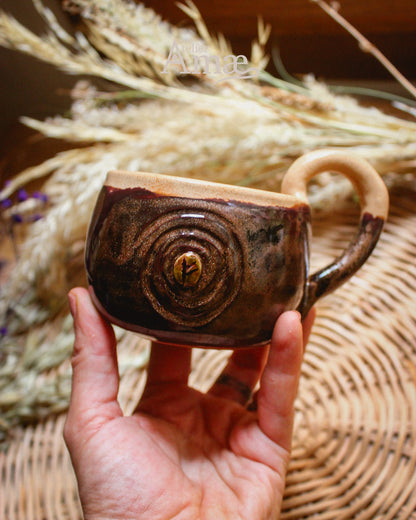 Cup inlaid with the Fehu rune and its Spiral