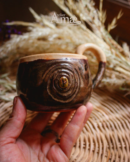 Cup inlaid with the Fehu rune and its Spiral